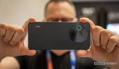 TCL 60 XE NXTPAPER 5G held horizontally for a photo