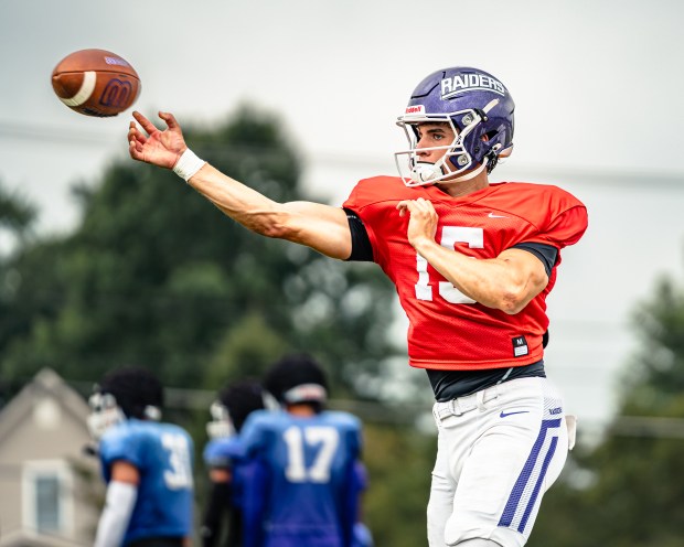 Mike Maloney - shown in a preseason practice - threw five touchdown passes in his first-ever start for Mount Union Sept. 6 in a 37-29 win over Wheaton. (Alex DeVito - Mount Union Athletics)