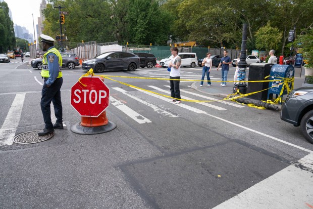 A traffic pole at the northwest corner of W. 81st St. and Central Park West in Manhattan toppled on Saturday, Sept. 6, 2025, injuring four people. (Theodore Parisienne / New York Daily News)