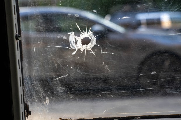 A 24-year-old man was running away from an attacker when he was shot multiple times in the chest in front of a building near Crooke and Ocean Aves. in Flatbush, Brooklyn on Wednesday, Sept. 17, 2025. (Theodore Parisienne / New York Daily News)