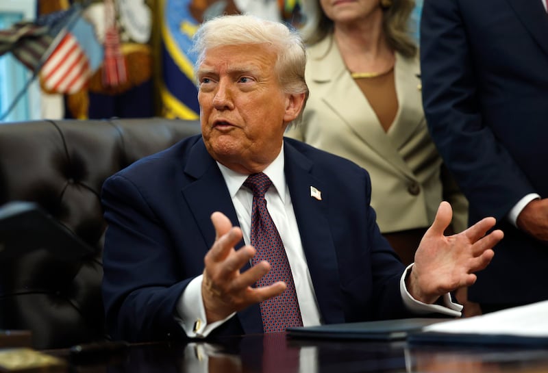 WASHINGTON, DC - SEPTEMBER 15:  U.S. President Donald Trump answers questions from reporters after signing a Presidential Memorandum in the Oval Office on September 15, 2025 in Washington, DC. Trump signed a memorandum that will send members of the National Guard and federal law enforcement agencies to Memphis, Tennessee in an effort to decrease crime in the city.  (Photo by Kevin Dietsch/Getty Images)