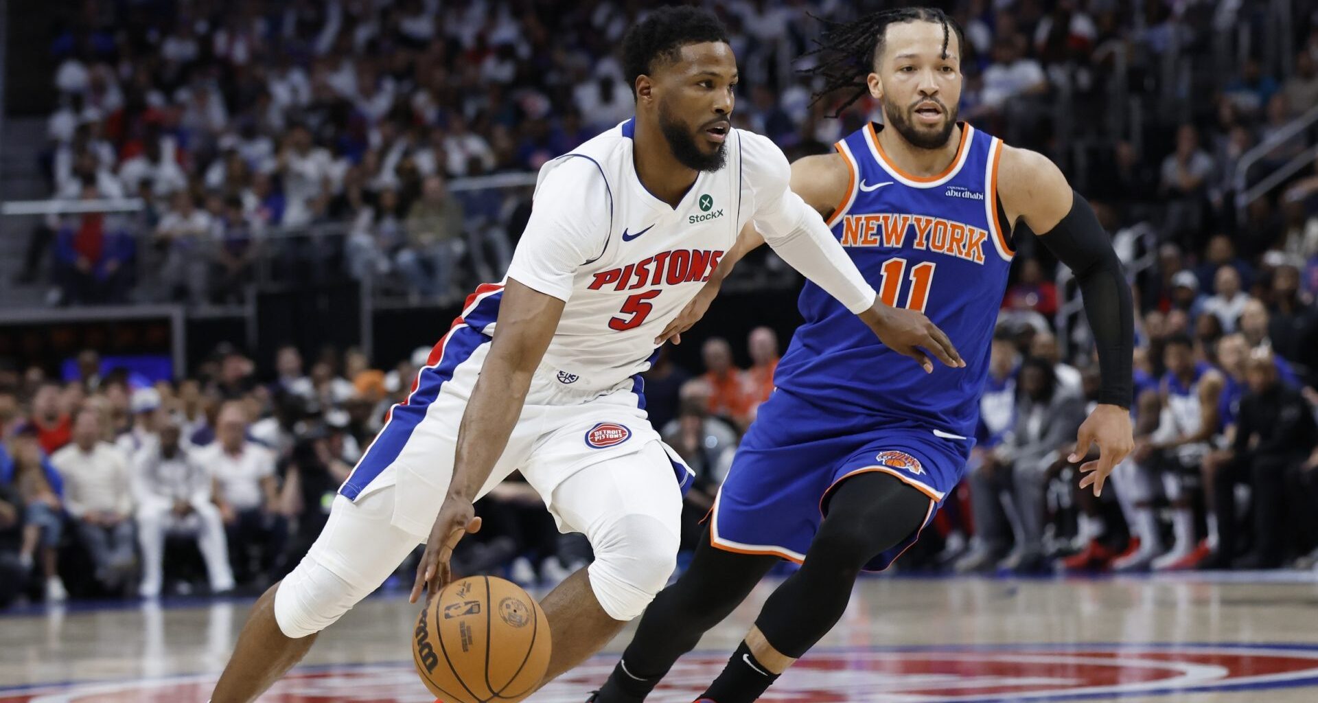 Apr 24, 2025; Detroit, Michigan, USA; Detroit Pistons guard Malik Beasley (5) dribbles on New York Knicks guard Jalen Brunson (11) in the second half during game three of first round for the 2024 NBA Playoffs at Little Caesars Arena.