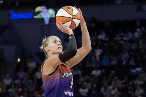 Jul 16, 2025; Minneapolis, Minnesota, USA; Phoenix Mercury guard Kitija Laksa (9) shoots against the Minnesota Lynx in the third quarter at Target Center. Mandatory Credit: Bruce Kluckhohn-Imagn Images