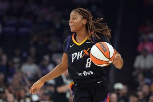 Sep 2, 2025; Phoenix, Arizona, USA; Phoenix Mercury guard Monique Akoa Makani (8) drives against the Indiana Fever in the first half at PHX Arena. Mandatory Credit: Rick Scuteri-Imagn Images