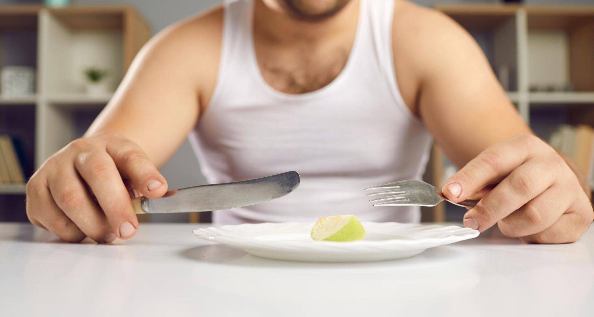 Unhappy Man Dieting Small Portion