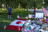 Utah Valley University student Alec Vera stands near a memorial for Charlie Kirk on Friday,...
