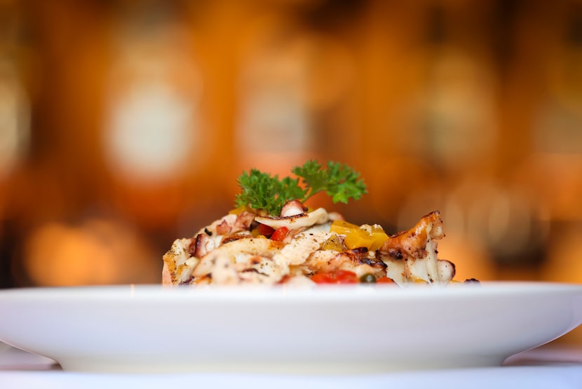 Grilled octopus at Avra in Dallas is tossed with with vidalia onions, capers, bell peppers...