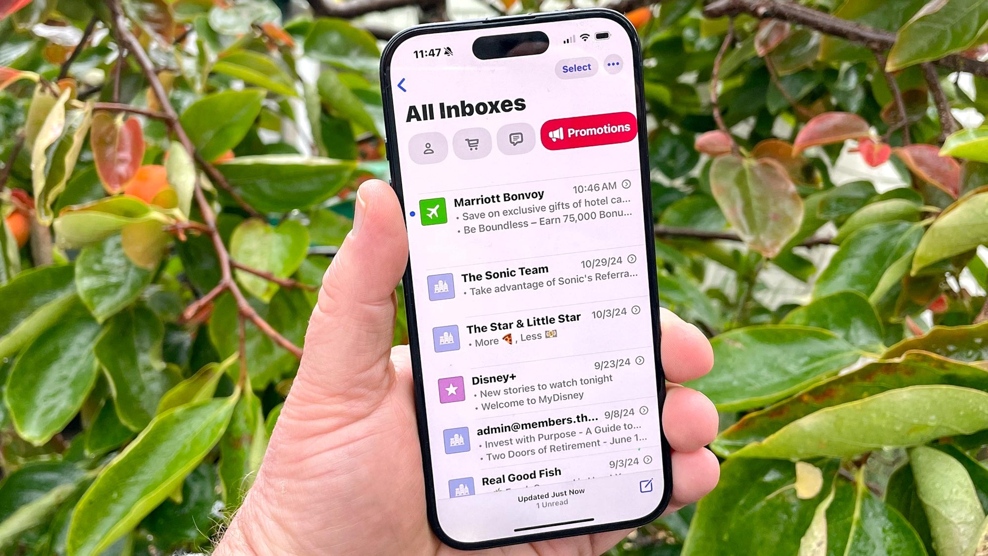 Redesigned Mail interface in iOS 18.2 on an iPhone