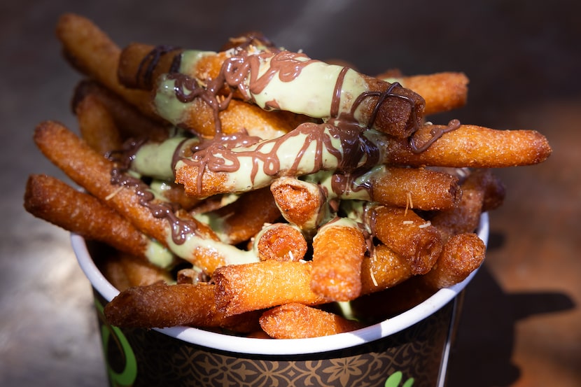 Rousso’s Dubai Chocolate Funnel Cake Fries during the Texas State Fair opening day at Fair...