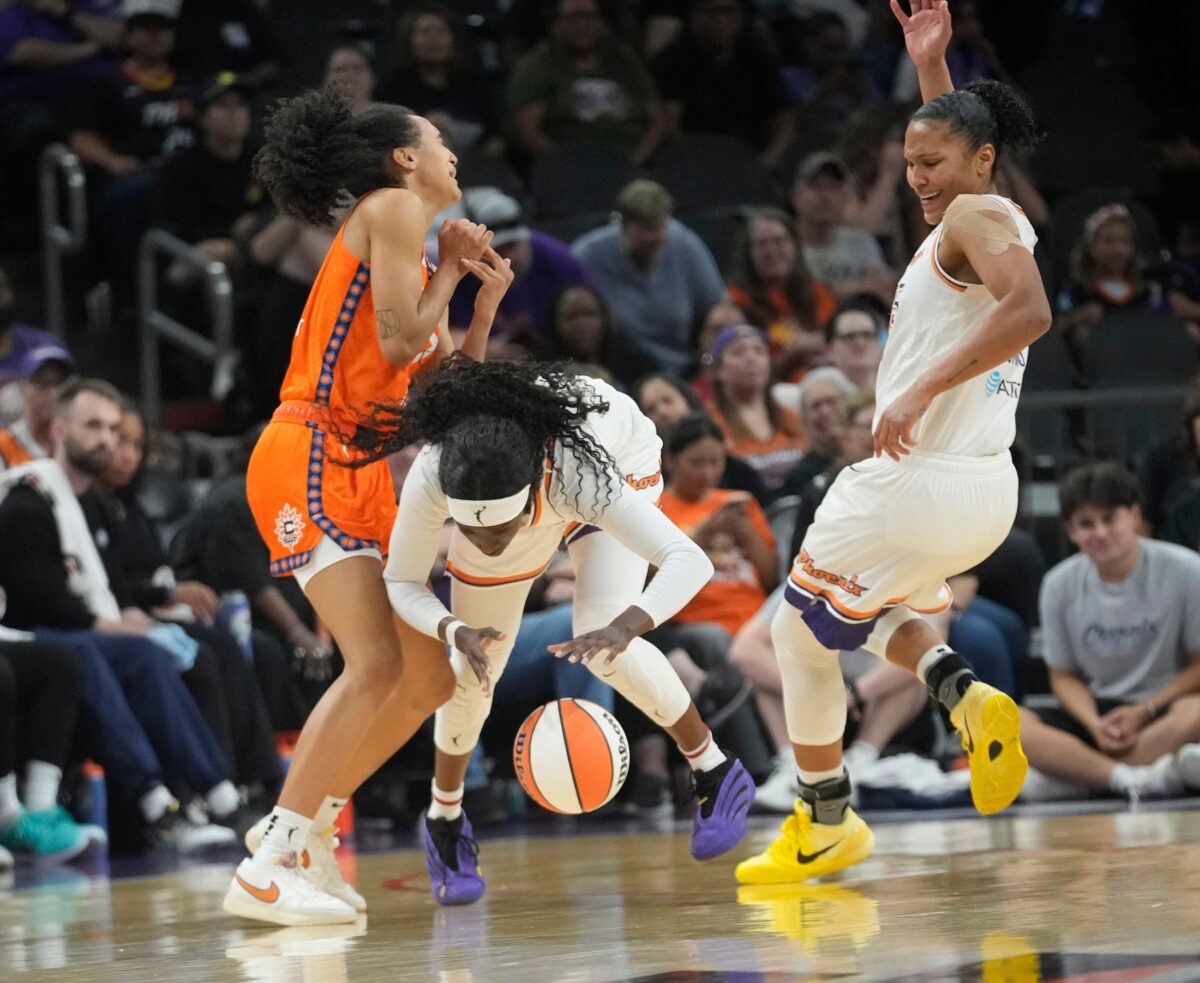 Connecticut Sun guard Leila Lacan (47) fouls Phoenix Mercury guard Kahleah Copper (2) as forward Alyssa Thomas (25) gets out of the way during the fourth quarter in Phoenix, at PHX Arena on Aug 5, 2025.