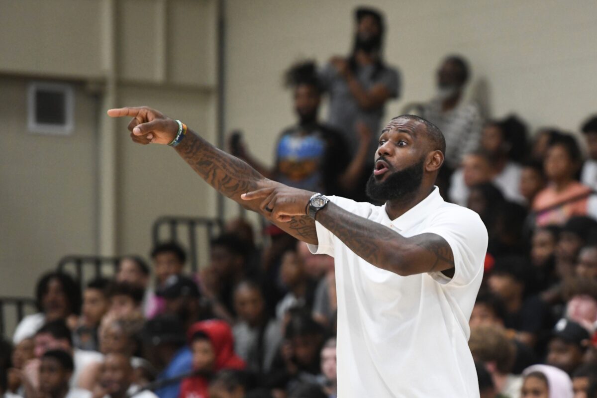 NBA star LeBron James coaches Strive for Greatness during the Strive for Greatness and Mokan Elite basketball game at the fourth day of the Nike Peach Jam at Riverview Park Activities Center.