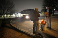 Curtis Howard, Plano’s director of Neighborhood Services, right, talks with a man...