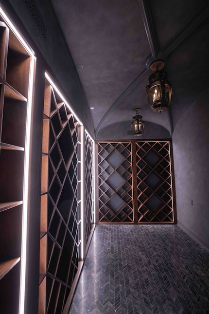 A wine cellar in the basement of 4400 Belfort Place has a ribbed ceiling, one of many...