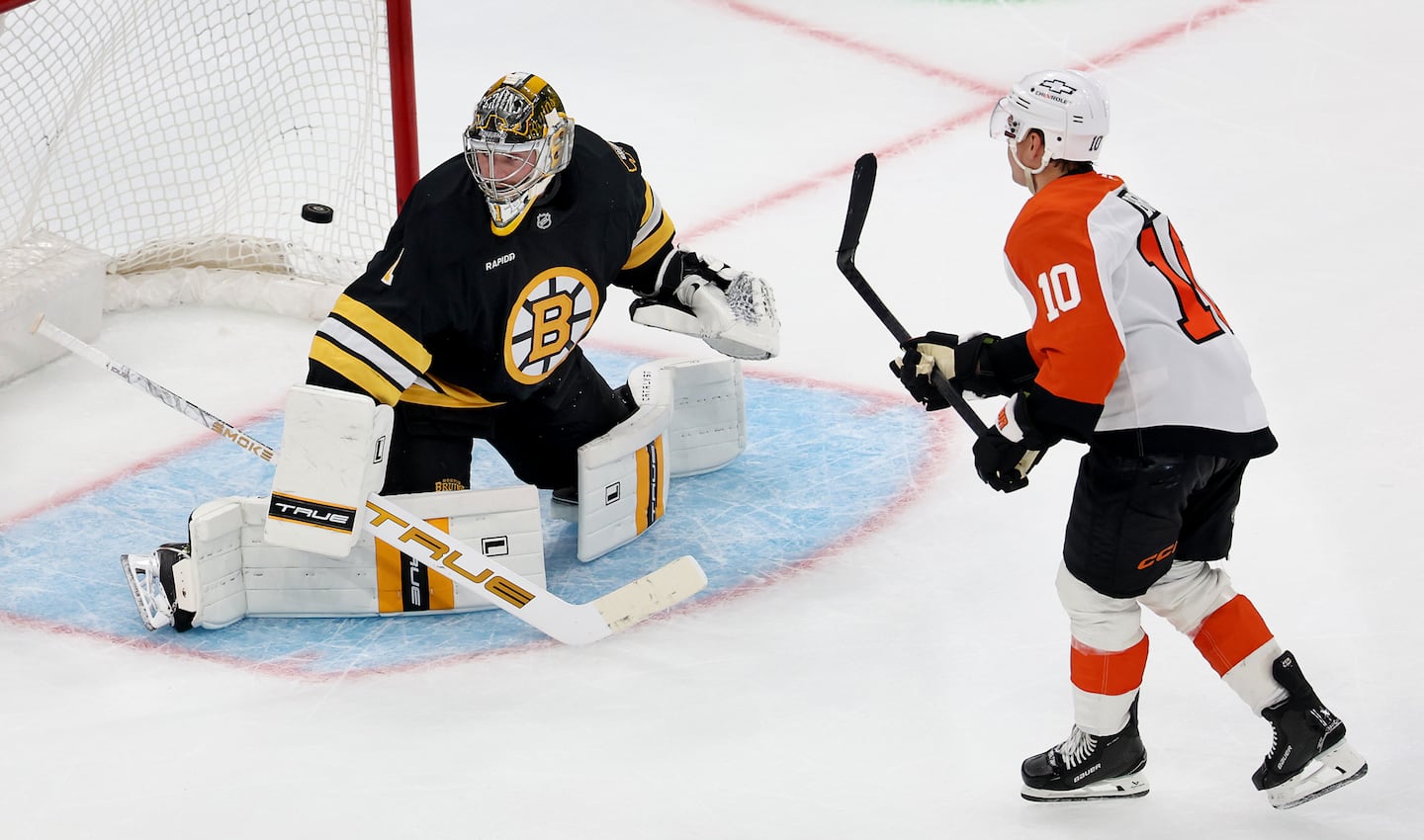 The Flyers’ Bobby Brink beats Bruins goalie Jeremy Swayman for the winning goal in the shootout.