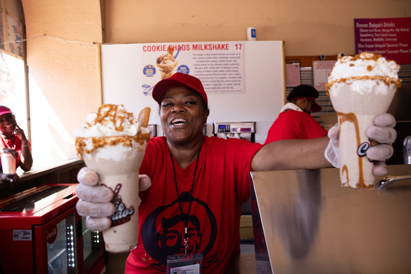 Susan Cooper serves the Cookie Chaos Milkshake during the Texas State Fair opening day at...