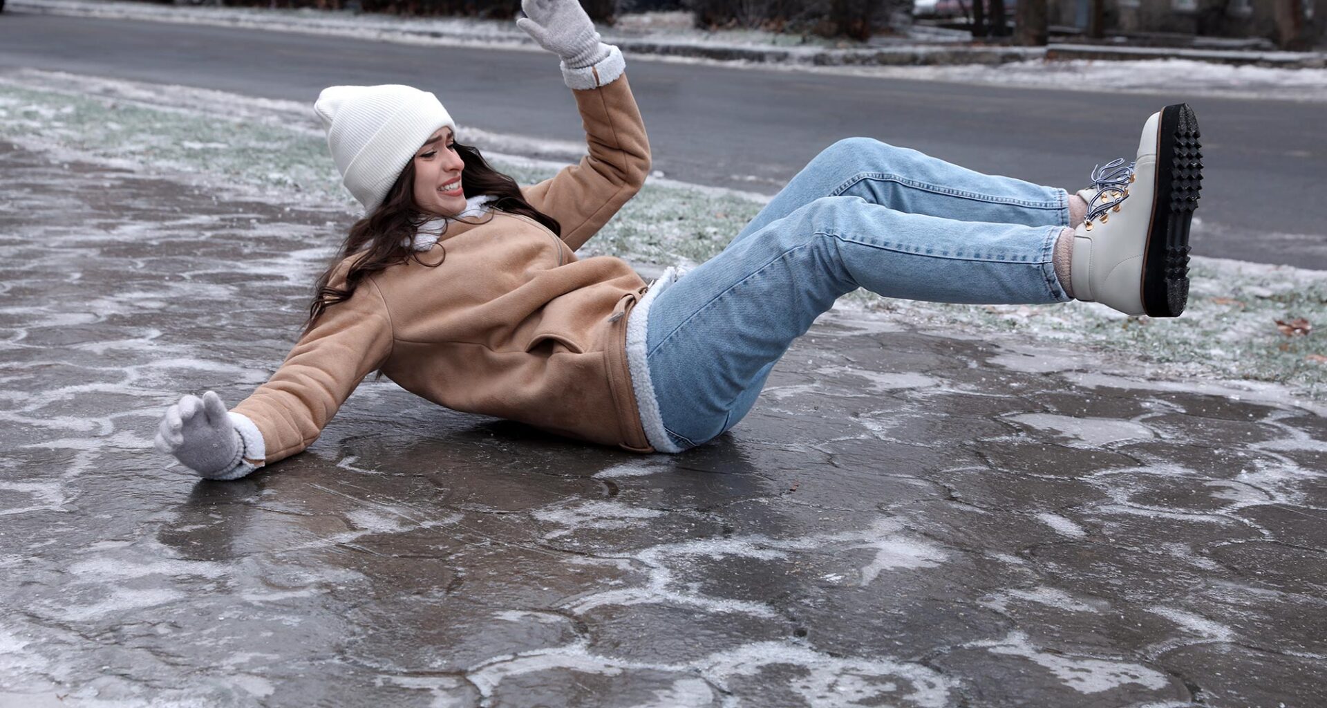 Young Woman Slip on Ice