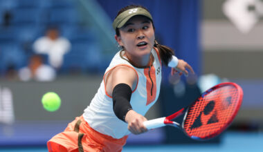 What's in Zhu Lin's notebook that she brings to matches?