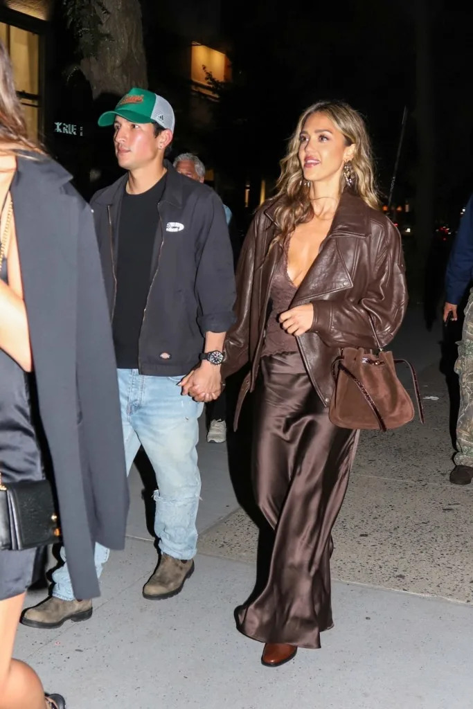 She paired the look with a chocolate brown coat and matching boots. Alessandra G / BACKGRID