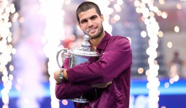 Carlos Alcaraz poses with the trophy after winning his second US Open title Sunday in New York.