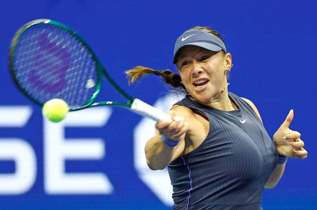 Amanda Anisimova of the USA playing tennis.