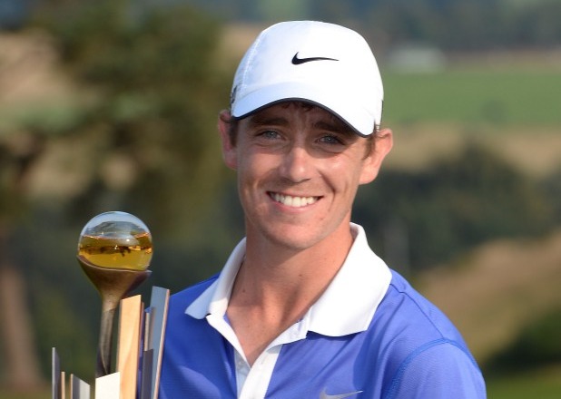 AUCHTERARDER, SCOTLAND - AUGUST 25: Tommy Fleetwood of England with the winners trophy after the final round of the Johnnie Walker Championship at Gleneagles on August 25, 2013 in Auchterarder, Scotland. (Photo by Ross Kinnaird/Getty Images)
