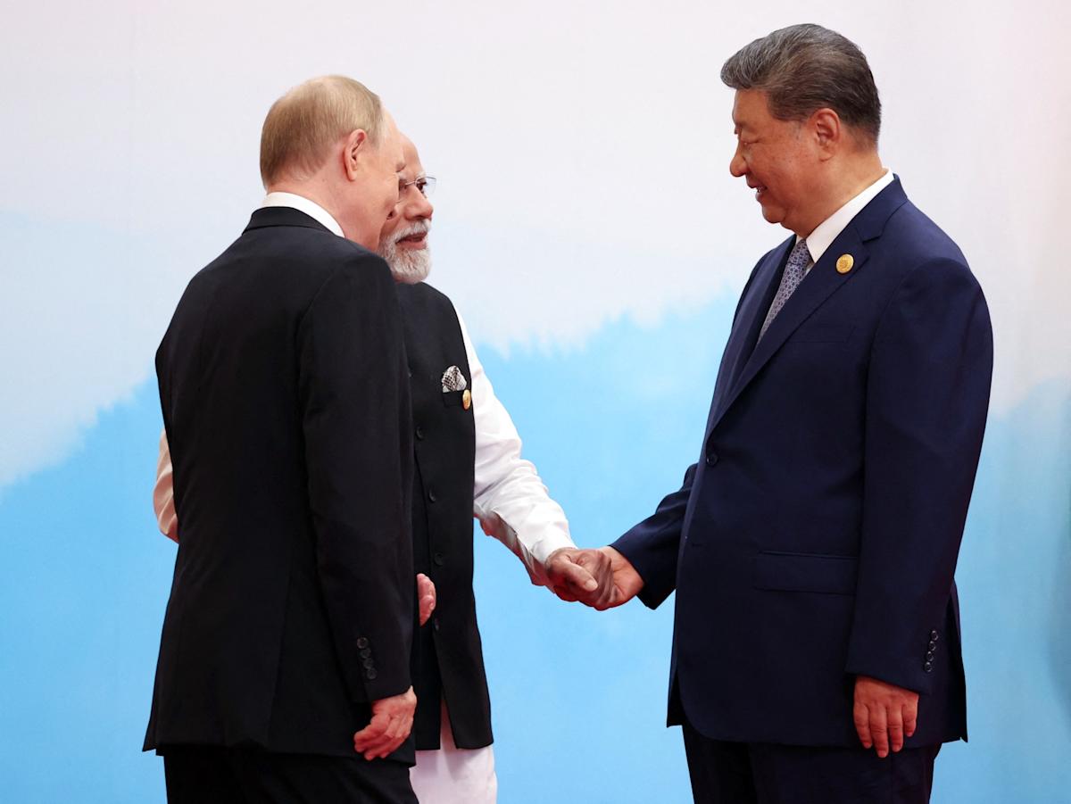 China’s Xi Redraws Geopolitical Map With Embrace of Putin, Modi