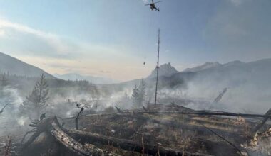 Fire crews working to extinguish a wildfire just west of Banff townsite