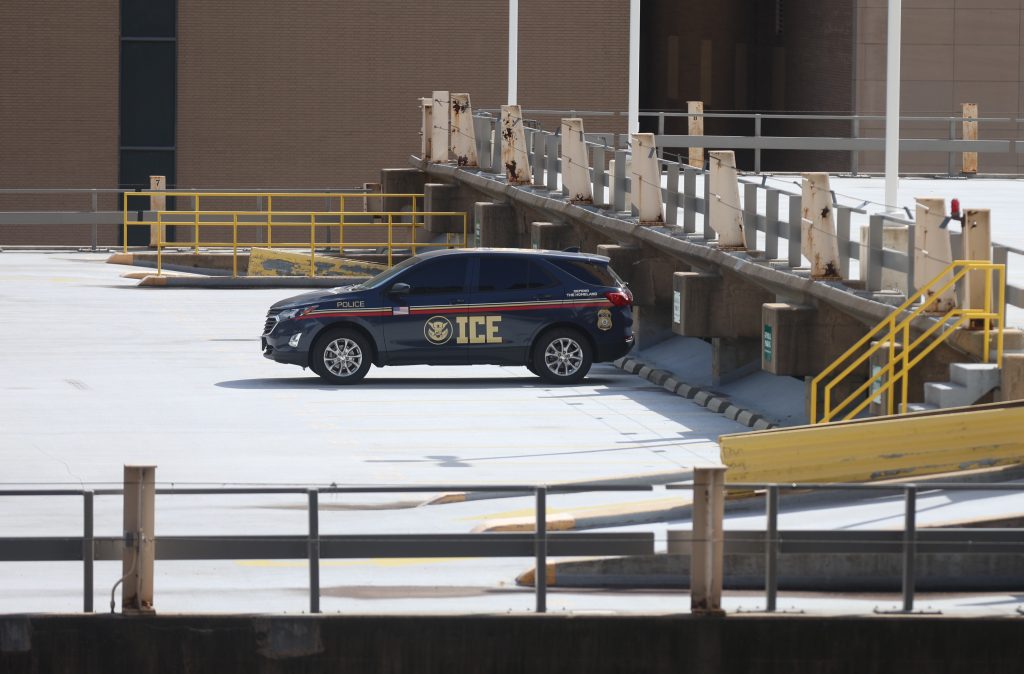 An Immigration and Customs Enforcement vehicle sits in the parking garage of the Metropolitan Correctional Center in the Chicago Loop on Saturday, Sept. 6, 2025 ahead of anticipated immigration raids across the Chicagoland area.
