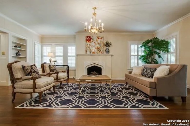 A stately formal living room inside the house denotes a life of luxury.