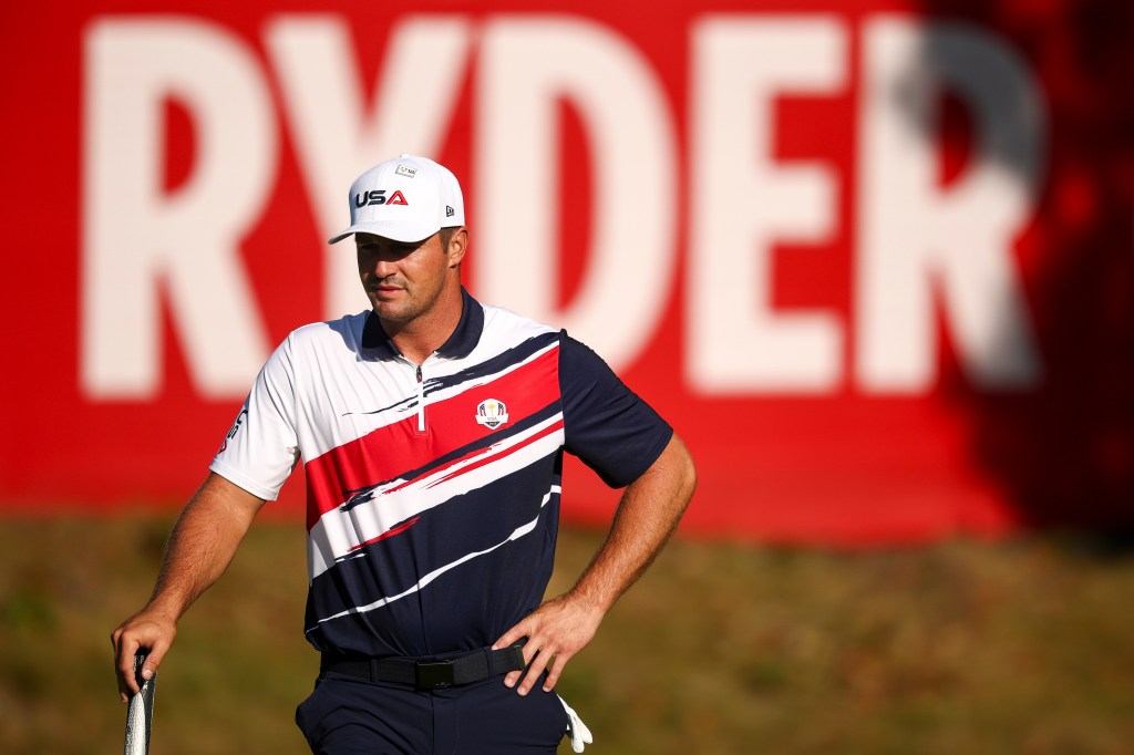 Bryson DeChambeau of Team United States looking across the second green during a practice round.