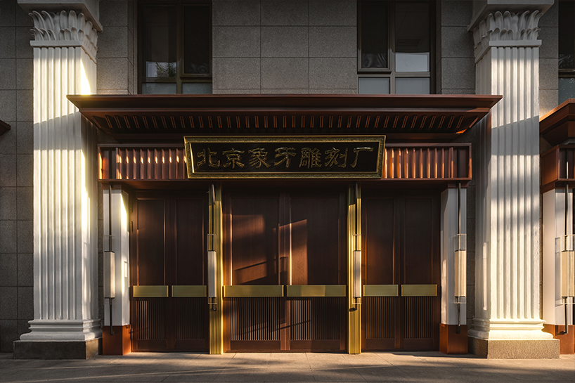 copper and glass frame beijing cultural hub for mammoth ivory carving by chuxin tuoyuan