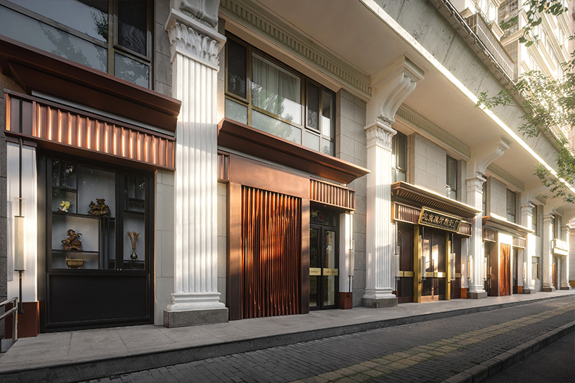 copper and glass frame beijing cultural hub for mammoth ivory carving by chuxin tuoyuan