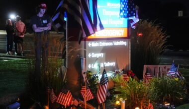 Ammon Paxton, a supporter of Charlie Kirk who witnessed the event as Kirk was shot and killed, visits a growing memorial outside Timpanogos Regional Hospital, Wednesday, Sept. 10, 2025, in Orem, Utah. (AP Photo/Lindsey Wasson)