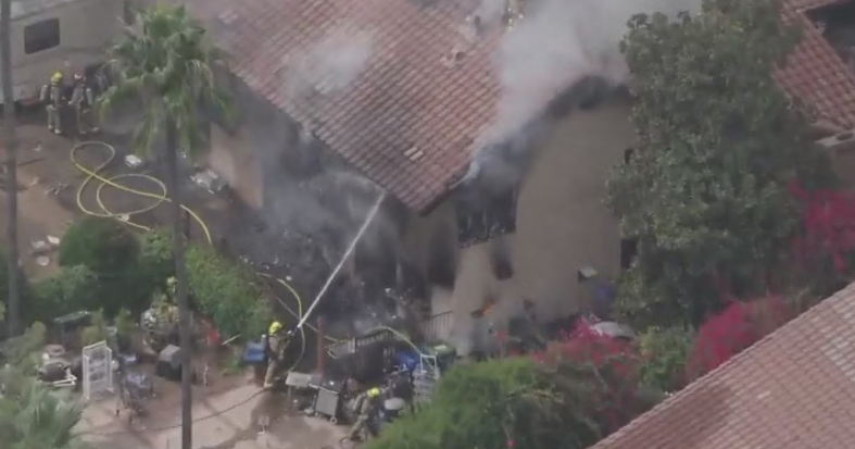 Firefighters in Chatsworth battle 2-story house fire