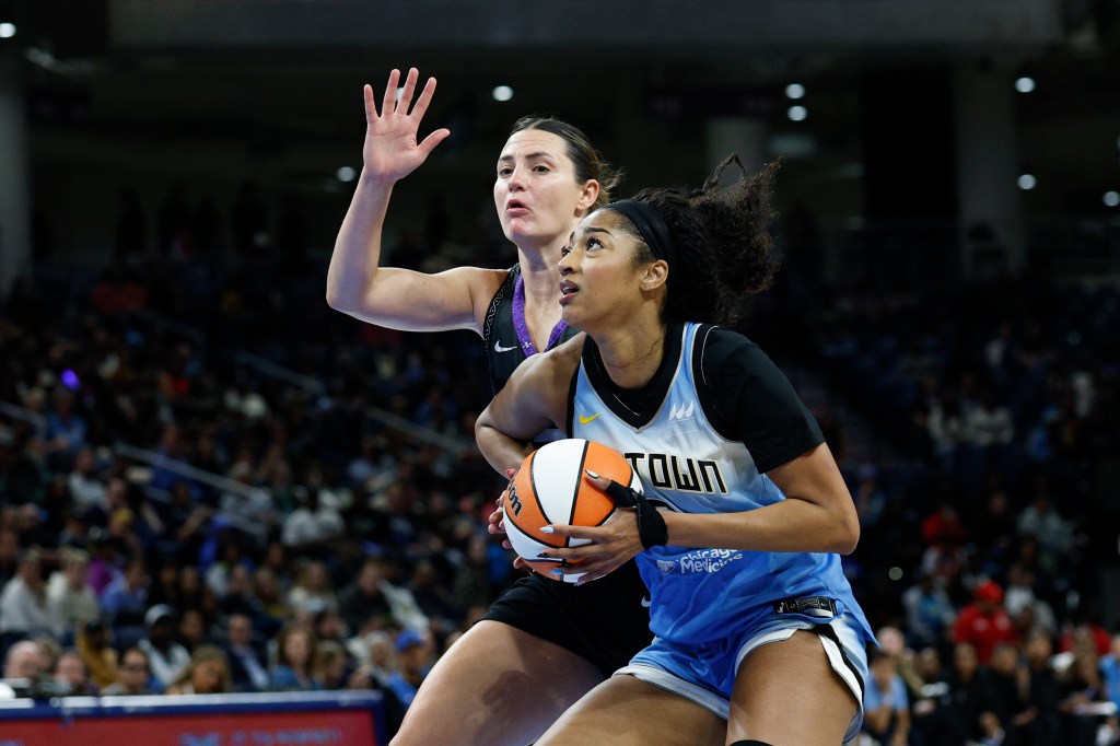 WNBA Chicago Sky player dribbling the ball.