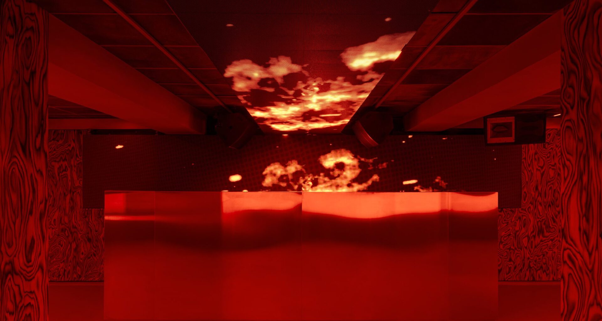 Red-lit nightclub interior
