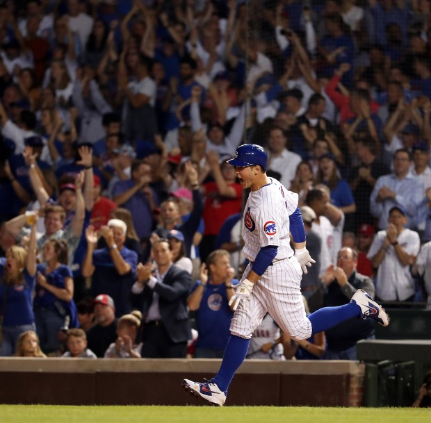 Cubs' Anthony Rizzo celebrates his home run against the Cardinals in the third inning on Sept. 19, 2019, at Wrigley Field. (Brian Cassella/Chicago Tribune)