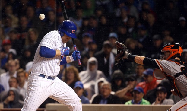 Cubs first baseman Anthony Rizzo is hit by a pitch in the eighth inning during a game against the Giants on May 22, 2017, at Wrigley Field. (Brian Cassella/Chicago Tribune)