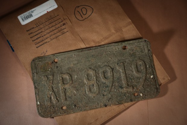 The weathered license plate from Karen Schepers’ car, which had...