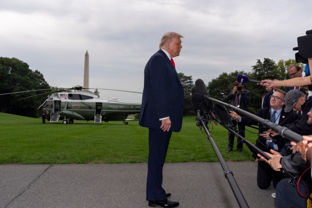 President Donald Trump speaks with reporters before departing on Marine One from the South Lawn of the White House, Sept. 16, 2025, in Washington. (Alex Brandon/AP)