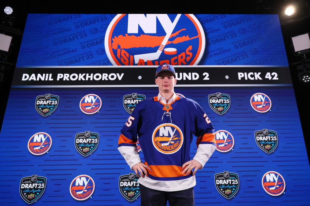 Daniil Prokhorov, wearing a New York Islanders jersey, at the 2025 NHL Draft.
