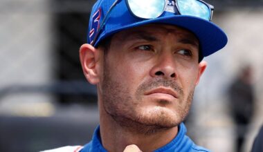 NASCAR driver Kyle Larson looking into the distance with a frown