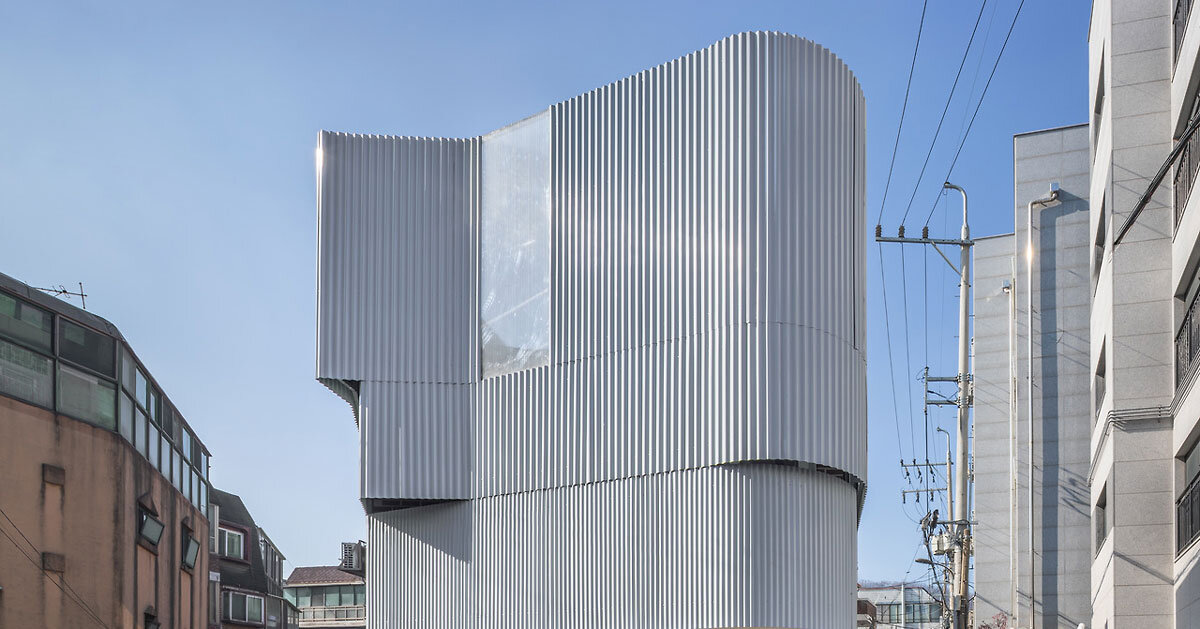 drawing works clads one-person house in seoul with layered corrugated steel facade