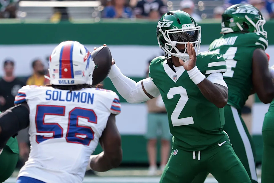 Sep 14, 2025; East Rutherford, New Jersey, USA; New York Jets quarterback Tyrod Taylor (2) drops back to pass against the Buffalo Bills during the second half at MetLife Stadium. Mandatory Credit: Vincent Carchietta-Imagn Images
