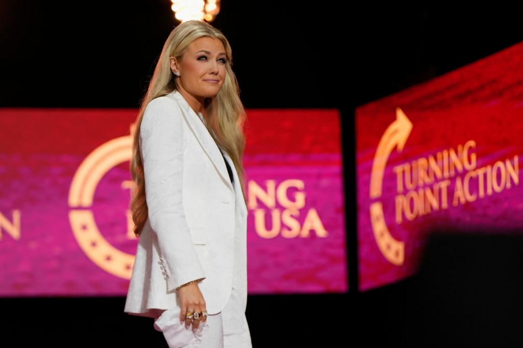 Erika Kirk departs after speaking at a memorial for her husband, conservative activist Charlie Kirk.