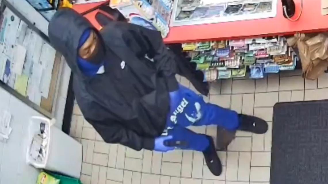 Police release surveillance video of gunmen robbing store on Interstate 45