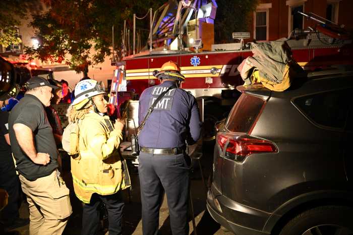 firefighters and EMS workers at the scene of a fire in Brookyn 