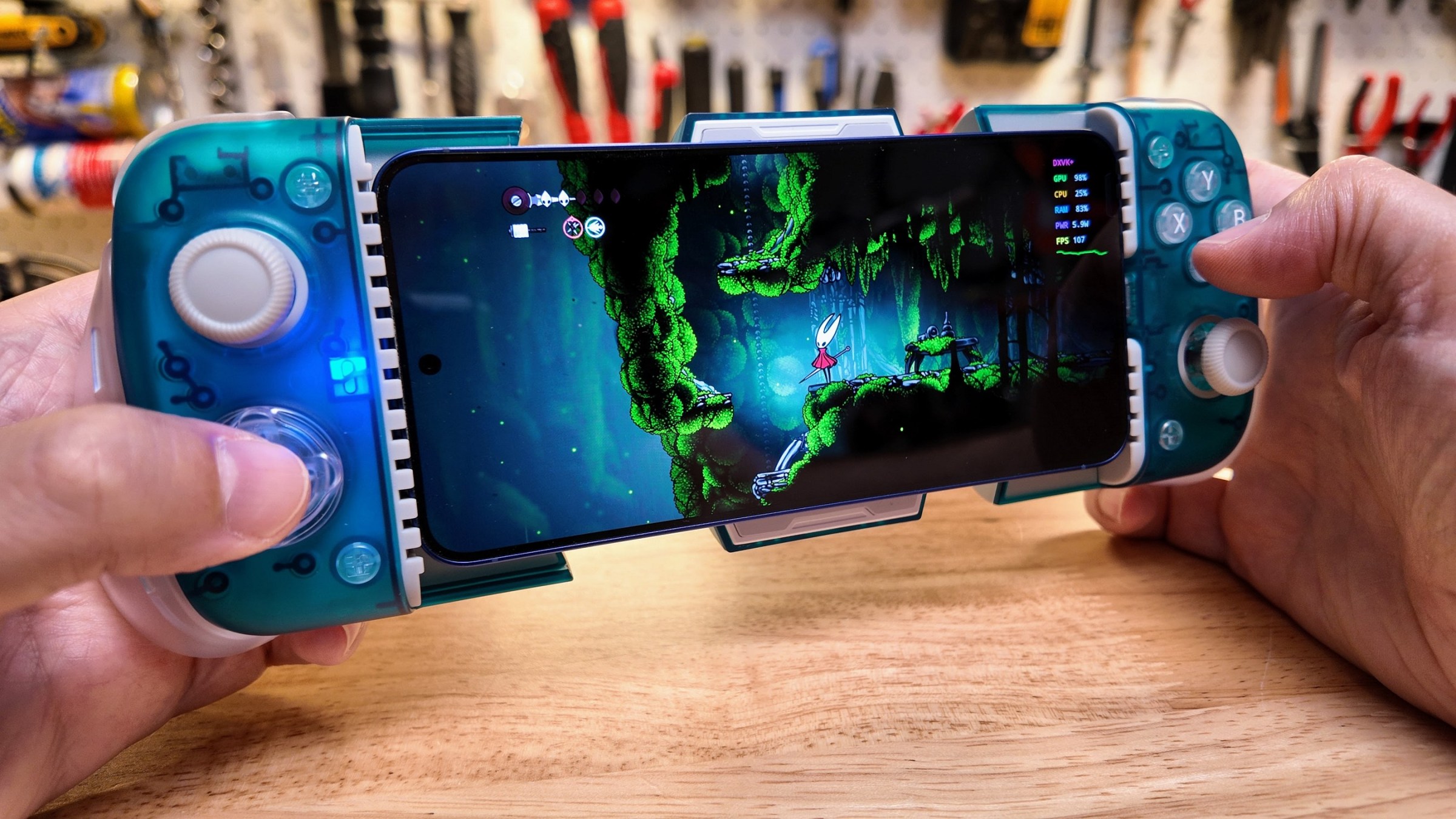 Hollow Knight Silksong running on a phone.