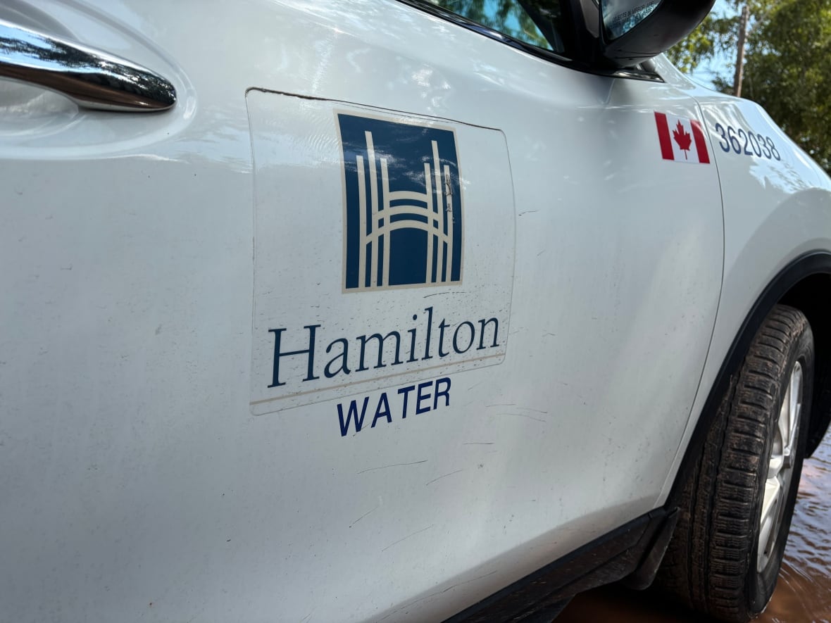 The side of a car that reads "Hamilton Water"