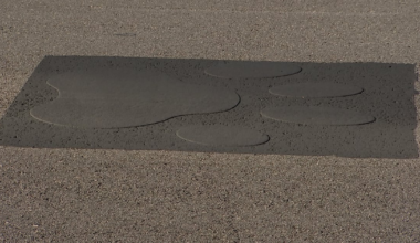 Jaguar paws on Bay Street painted over following Florida order on road art – 104.5 WOKV
